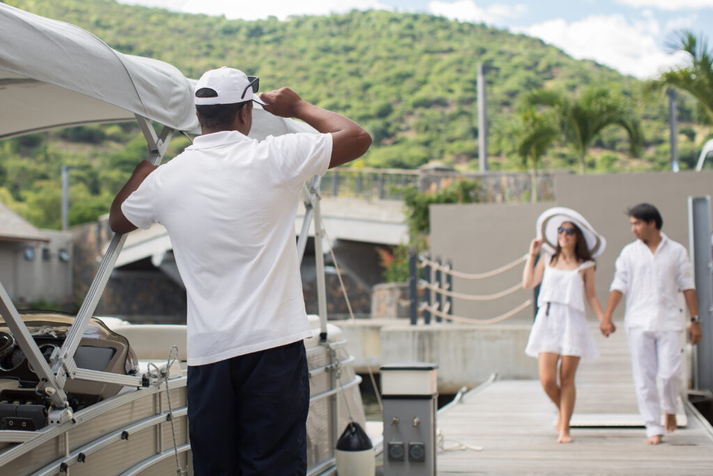 TCrewed Catamaran Charter in the British Virgin Islands. Captain waiting for guests